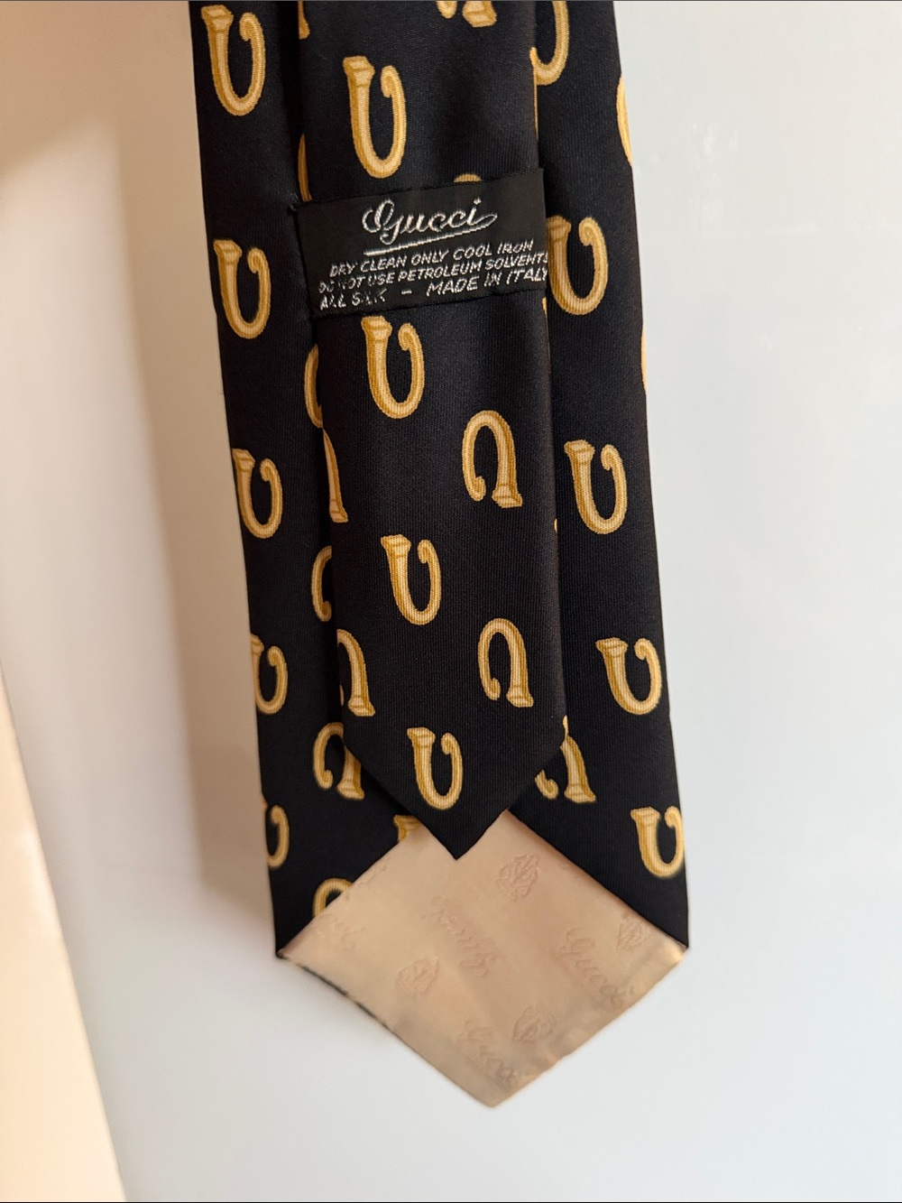 Gucci Black Silk Tie with Gold Horseshoe Motif - Picture 1 of 4